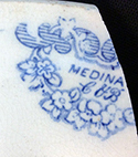 Printed underglaze refined white earthenware plate with romantic motif pattern named “Medina”. Printed manufacturer’s mark on reverse for Cotton and Barlow, Staffordshire (1850-1855). Rim diameter:  9.00” from 18BC27, Feature 30.
